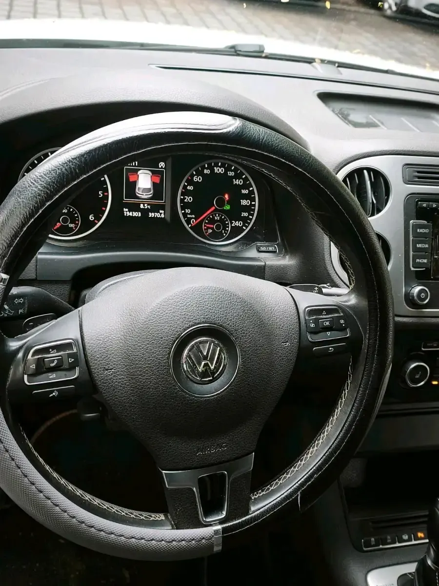 Second-hand VW Tiguan Cup 177 CP (130 kW) 2014 Alb SUV