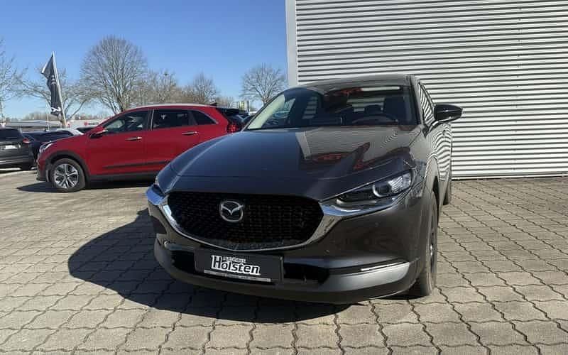 Grau Gebraucht 2024 Mazda CX-30 Homura-Line SUV | 29.980 € - Bild 1/4