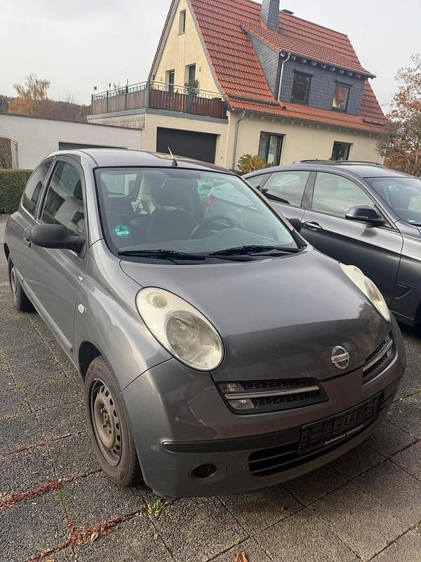 Grau Gebraucht 2006 Nissan Micra Limousine | 1.500 € (Fairer Preis) - Bild 1/4