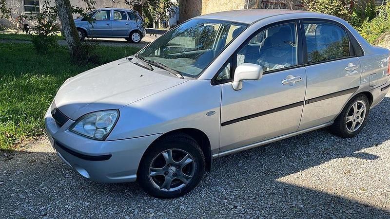 Grau Gebraucht 2008 Suzuki Liana Limousine | 1.400 € - Bild 1/4