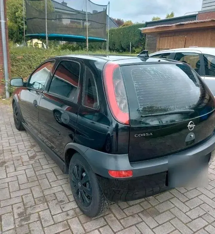 Second-hand Opel Corsa 75 CP (55 kW) 2002 Negru Hatchback