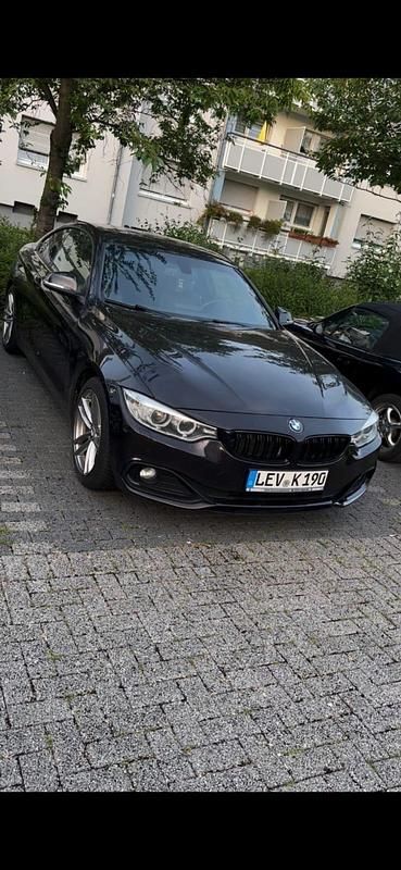 Braun Gebraucht 2014 BMW 420 Coupé | 10.900 € - Bild 1/3