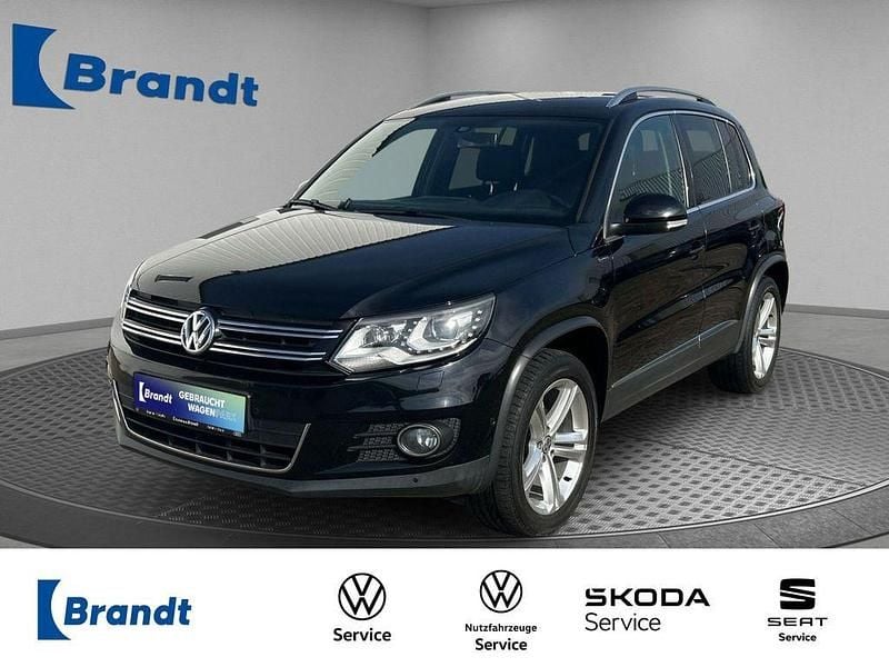 2t deep black perleffekt (metallic) Gebraucht 2015 VW Tiguan Sport SUV | 11.990 € (Superpreis) - Bild 1/3