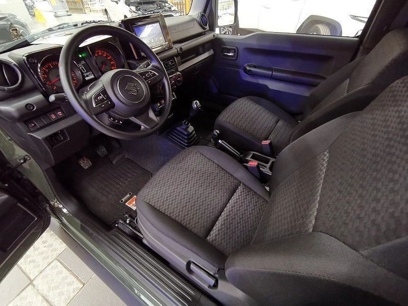 Grün Gebraucht 2024 Suzuki Jimny SUV | 32.349 € (Fairer Preis) - Bild 1/4