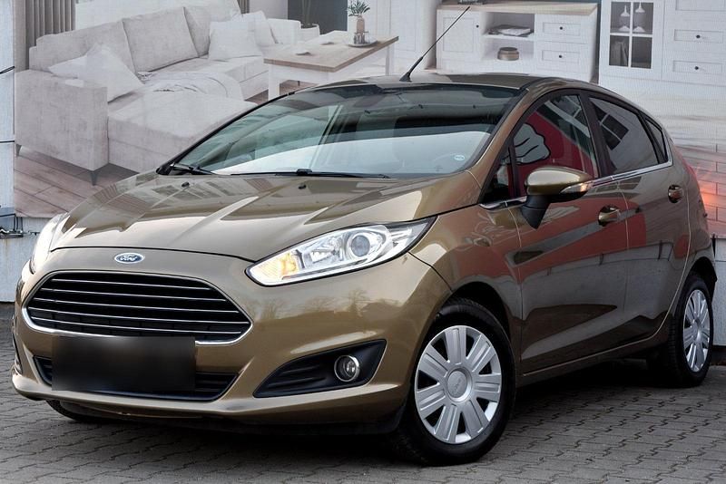 Gebraucht Ford Fiesta 101 PS (74 kW) 2014 Gold Kleinwagen