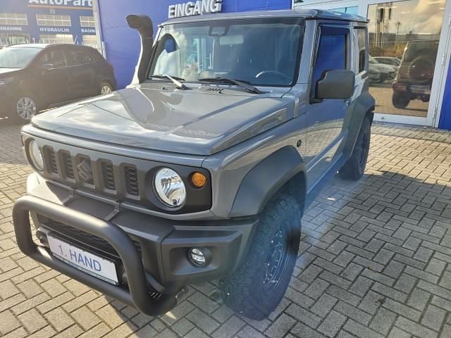 Gebraucht Suzuki Jimny Comfort 102 PS (75 kW) 2023 Solid medium gray SUV