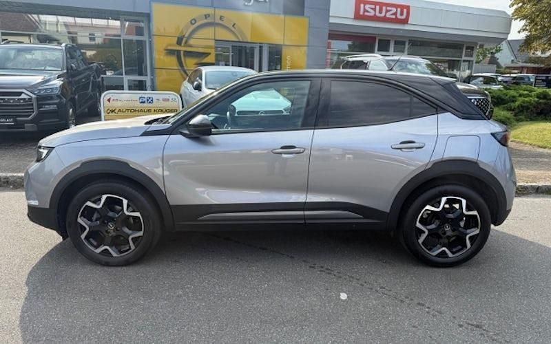 Gebraucht Opel Mokka Ultimate 131 PS (96 kW) 2023 Kontrast grau/quarz silber (metallic) SUV