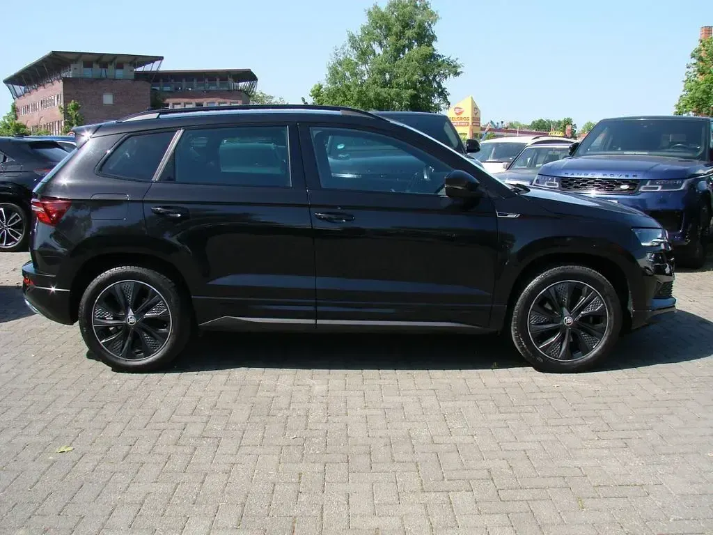 Gebraucht Skoda Karoq SportLine 190 PS (139 kW) 2023 Schwarz metallic SUV