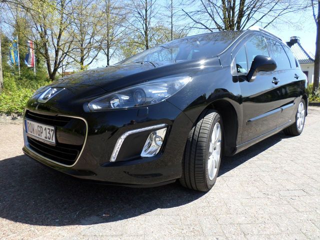 Gebraucht Peugeot 308 112 PS (82 kW) 2012 Schwarz metallic Kombi