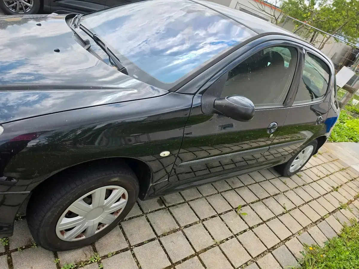 Gebraucht Peugeot 206 65 PS (47 kW) 2006 Schwarz Kleinwagen