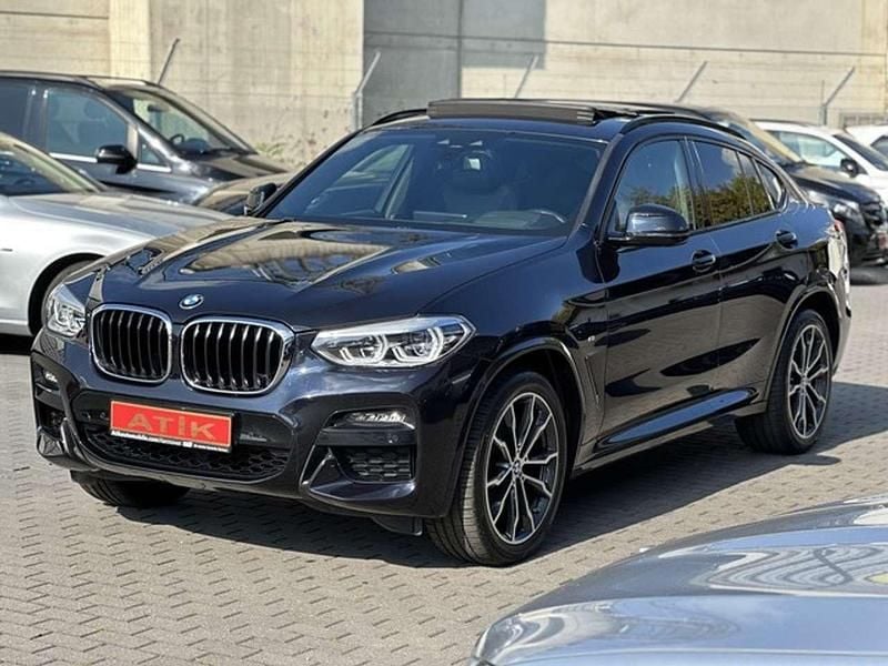 Carbonschwarz (metallic) Gebraucht 2020 BMW X4 Sport Line SUV | 33.880 € (Fairer Preis) - Bild 1/4