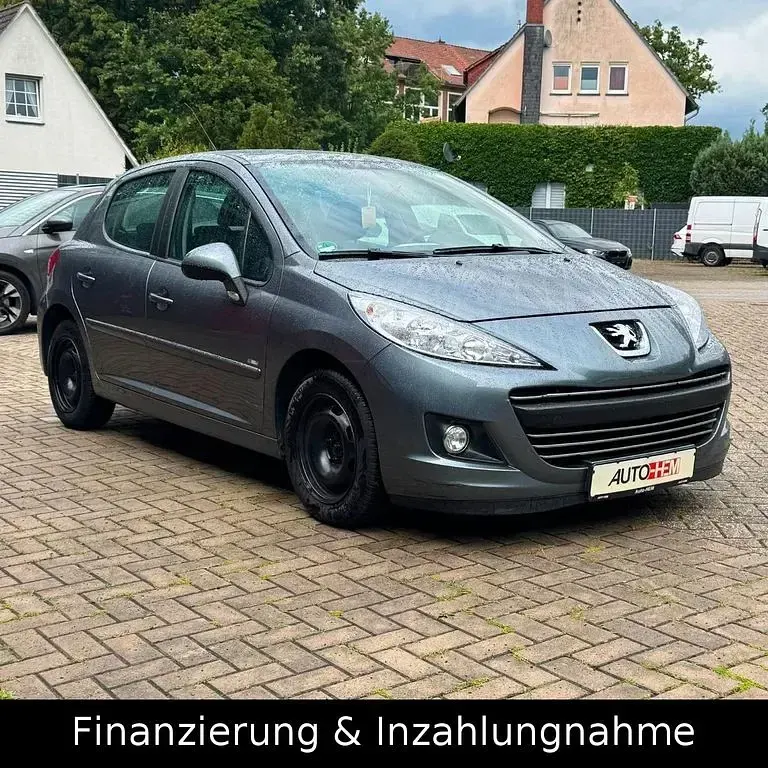 Gebraucht Peugeot 207 90 PS (66 kW) 2011 Grau Limousine