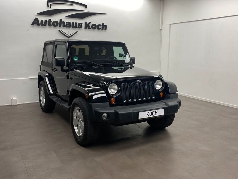 Schwarz Gebraucht 2012 Jeep Wrangler Unlimited Sahara SUV | 26.900 € (Fairer Preis) - Bild 1/4