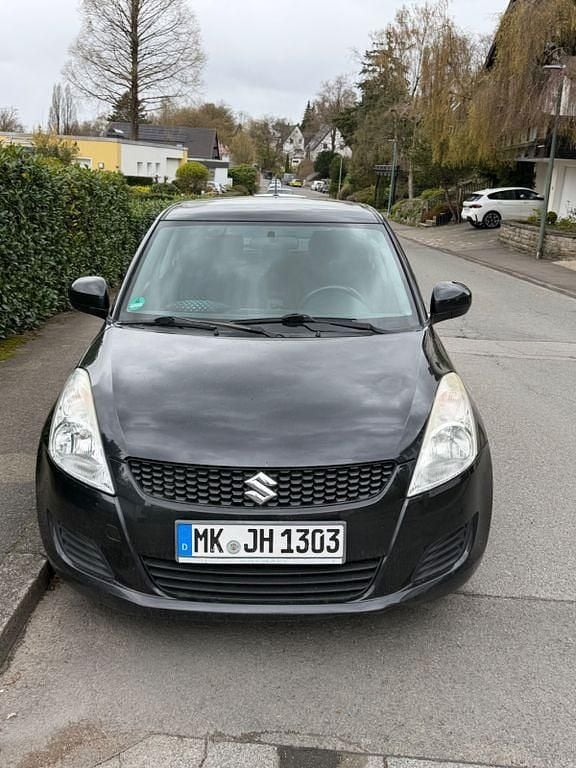 Second-hand Suzuki Swift 94 CP (69 kW) 2012 Negru Hatchback
