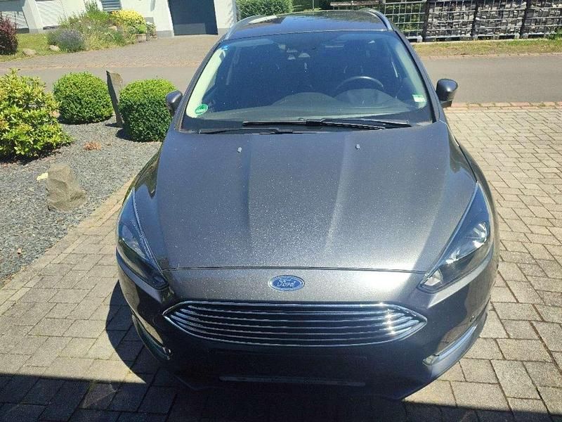 Gebraucht Ford Focus Titanium 125 PS (91 kW) 2014 Schwarz Kombi