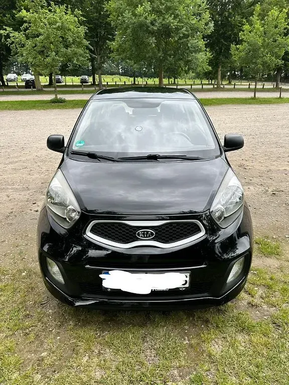 Gebraucht Kia Picanto Attract 69 PS (50 kW) 2012 Schwarz Kleinwagen