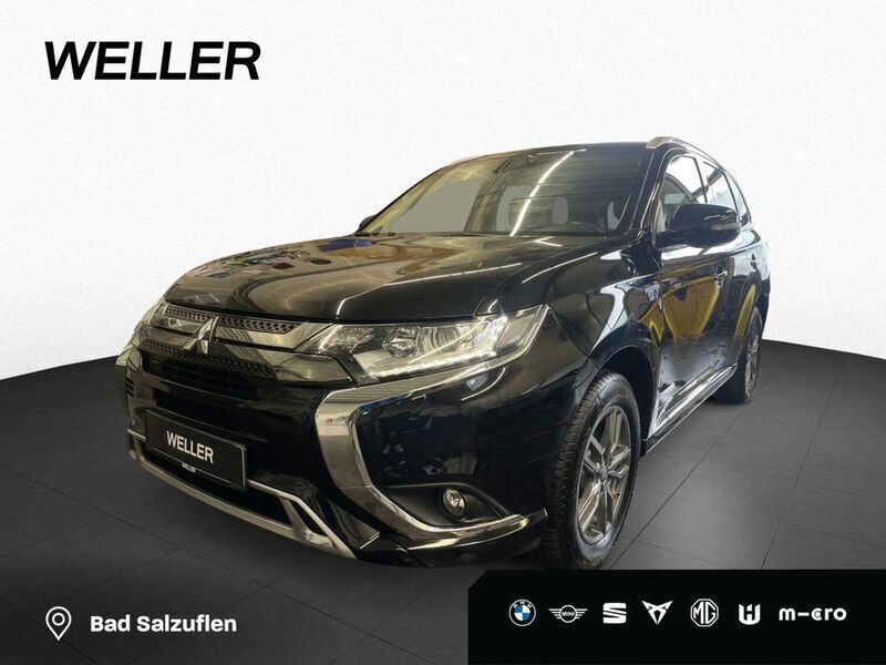 Pantherschwarz perleffekt (schwarz) Gebraucht 2021 Mitsubishi Outlander P-HEV Diamant Edition SUV | 21.380 € (Guter Preis) - Bild 1/4
