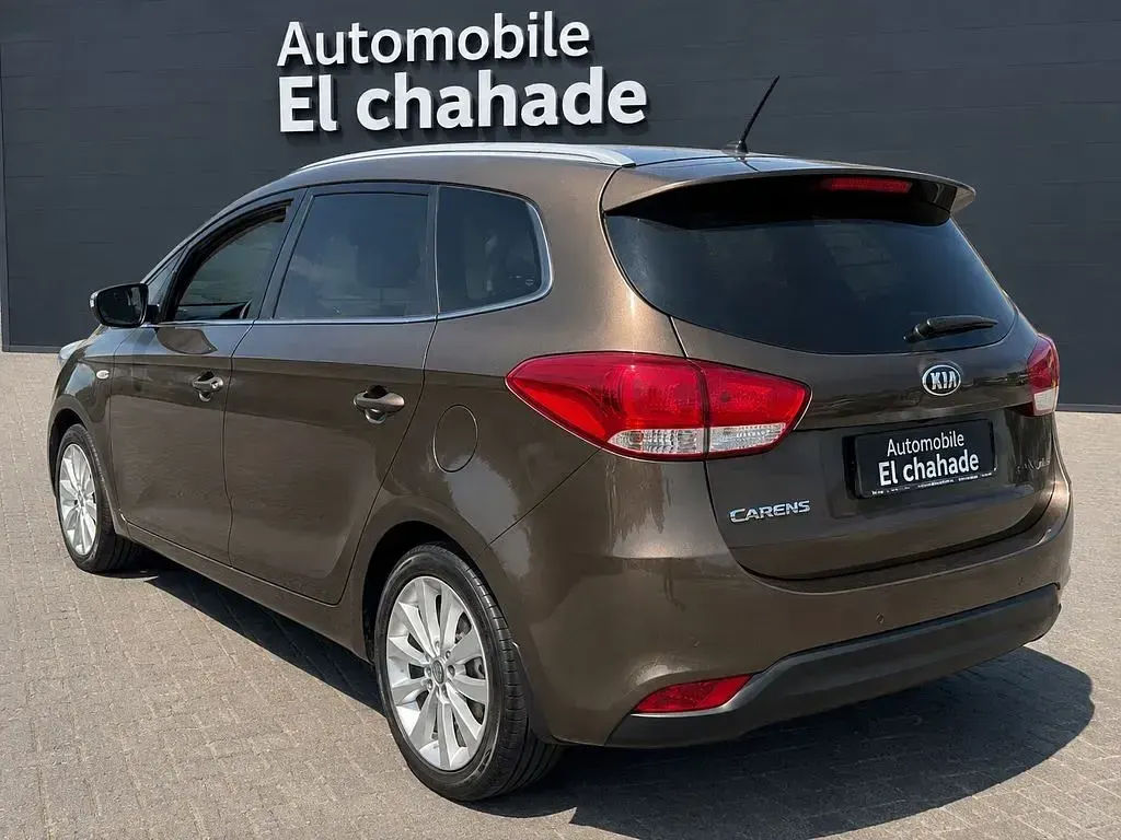 Gebraucht Kia Carens DREAM-TEAM Edition 135 PS (99 kW) 2015 Braun Van / Kleinbus