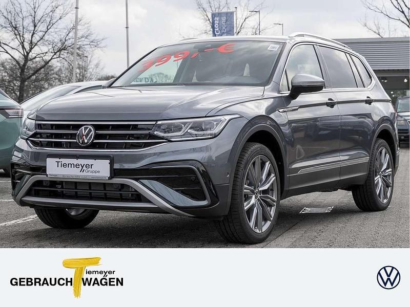 Platinum grey metallic Gebraucht 2024 VW Tiguan Allspace Elegance SUV | 45.790 € (Etwas zu teuer) - Bild 1/4