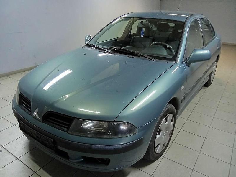 Grün Gebraucht 2003 Mitsubishi Carisma Comfort Edition Limousine | 1.000 € - Bild 1/4