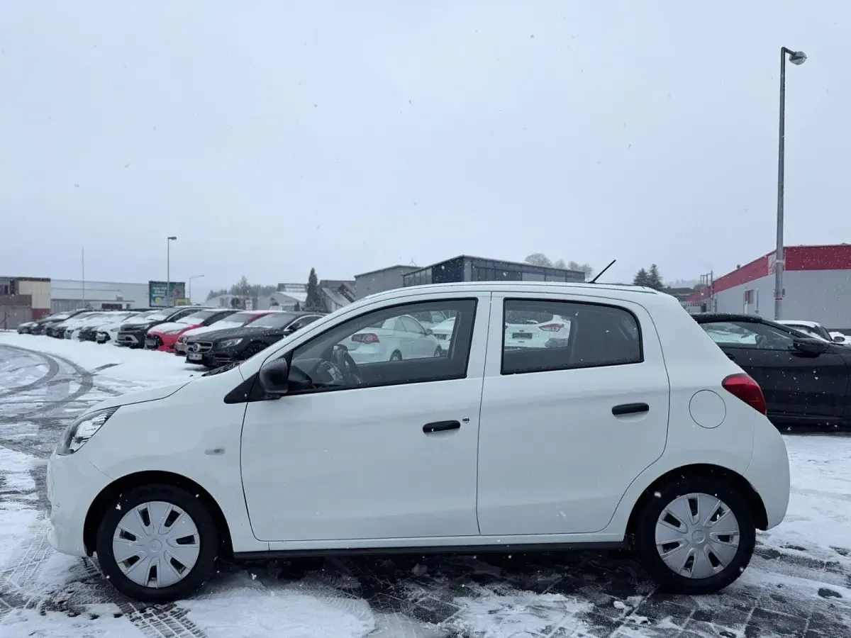 Gebraucht Mitsubishi Space Star Diamant Edition 71 PS (52 kW) 2015 Islandweiss (s) Kleinwagen