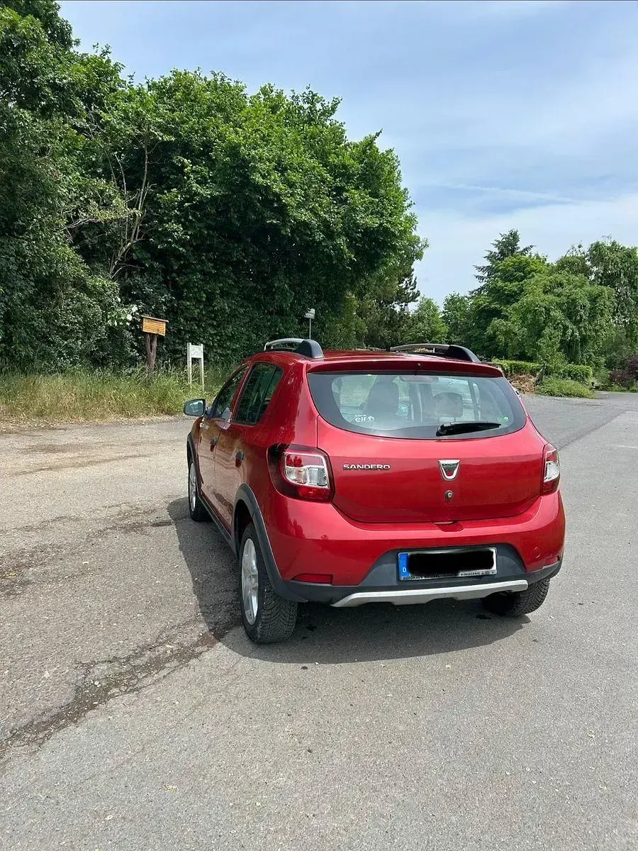 Gebraucht Dacia Sandero Stepway 90 PS (66 kW) 2013 Rot Limousine
