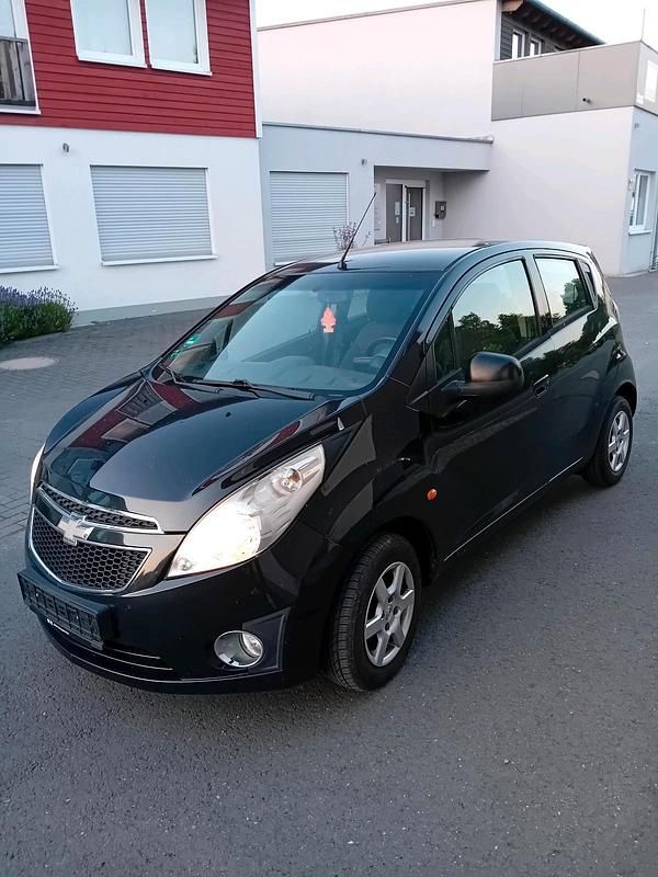 Schwarz Gebraucht 2011 Chevrolet Spark Kleinwagen | 1.000 € (Superpreis) - Bild 1/4