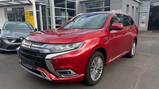 Rot Gebraucht 2019 Mitsubishi Outlander P-HEV Top SUV | 22.990 € (Fairer Preis) - Bild 1/3