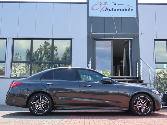 Grün Gebraucht 2022 Mercedes C300e Night Limousine | 43.900 € - Bild 1/4