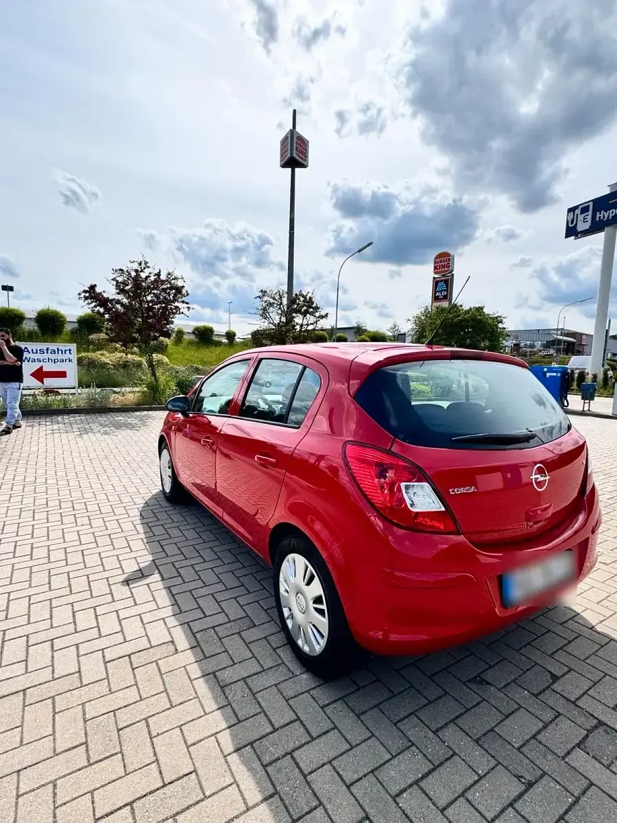 Gebraucht Opel Corsa 80 PS (58 kW) 2007 Rot Kleinwagen