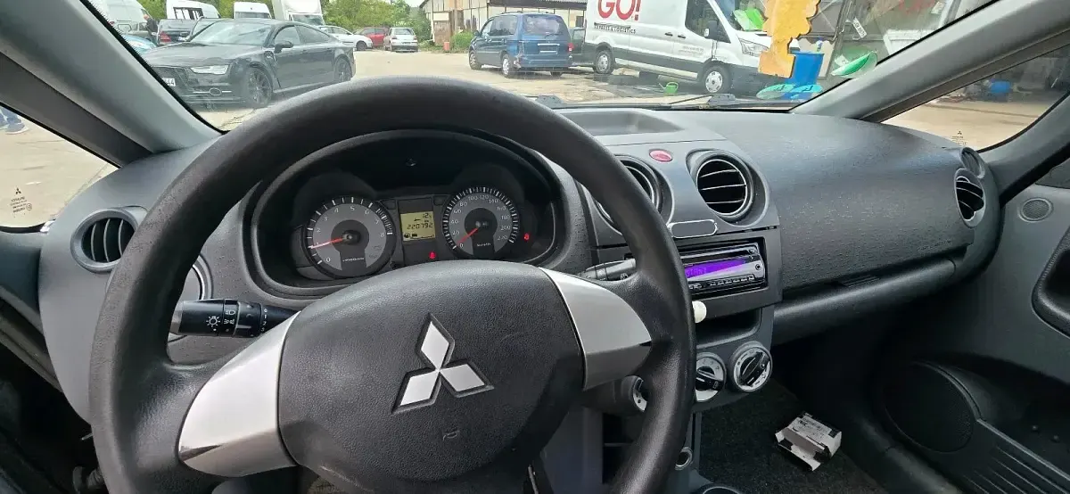 Gebraucht Mitsubishi Colt 75 PS (55 kW) 2010 Schwarz Kleinwagen