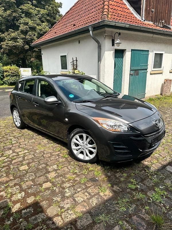Grau Gebraucht 2009 Mazda 3 Kleinwagen | 3.450 € (Fairer Preis) - Bild 1/4