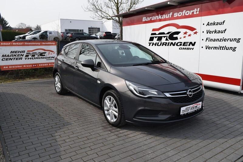 Grau Gebraucht 2016 Opel Astra Edition Limousine | 5.990 € (Fairer Preis) - Bild 1/4
