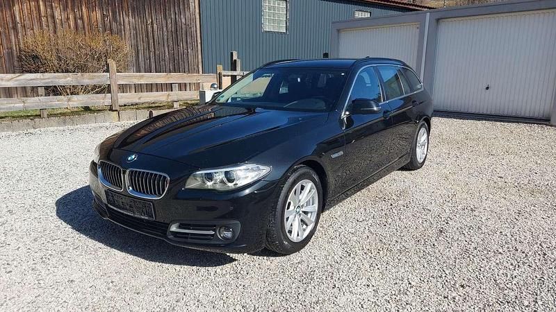 Gebraucht BMW 520 184 PS (135 kW) 2014 Black sapphire metallic Kombi