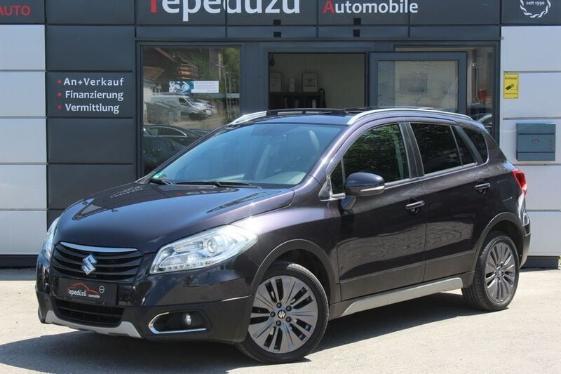 Grau Gebraucht 2015 Suzuki SX4 S-Cross Comfort+ SUV | 10.499 € (Fairer Preis) - Bild 1/4