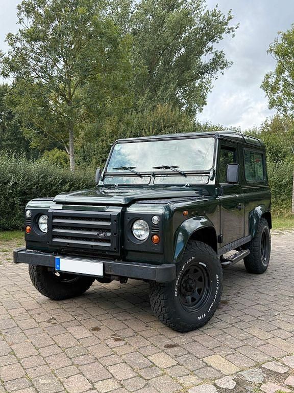 Grün Gebraucht 2002 Land Rover Defender SUV | 22.999 € (Superpreis) - Bild 1/4