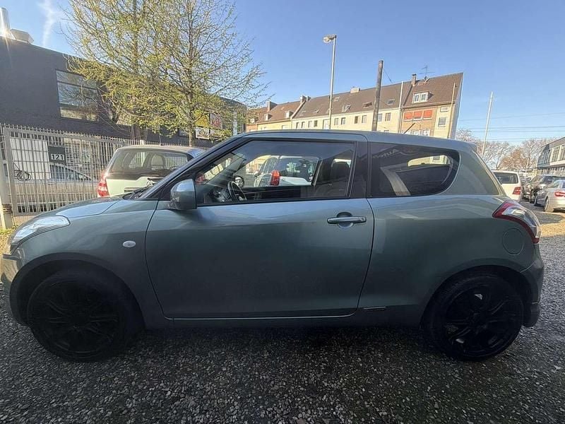 Gebraucht Suzuki Swift Comfort 94 PS (69 kW) 2011 Grün Kleinwagen
