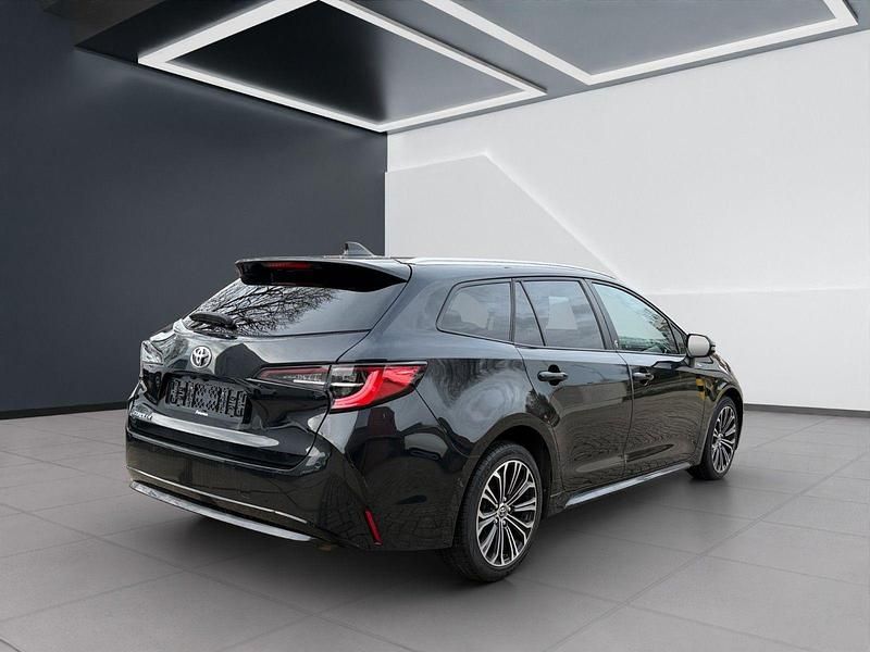 Gebraucht Toyota Corolla Team 116 PS (85 kW) 2022 Schwarz Kombi