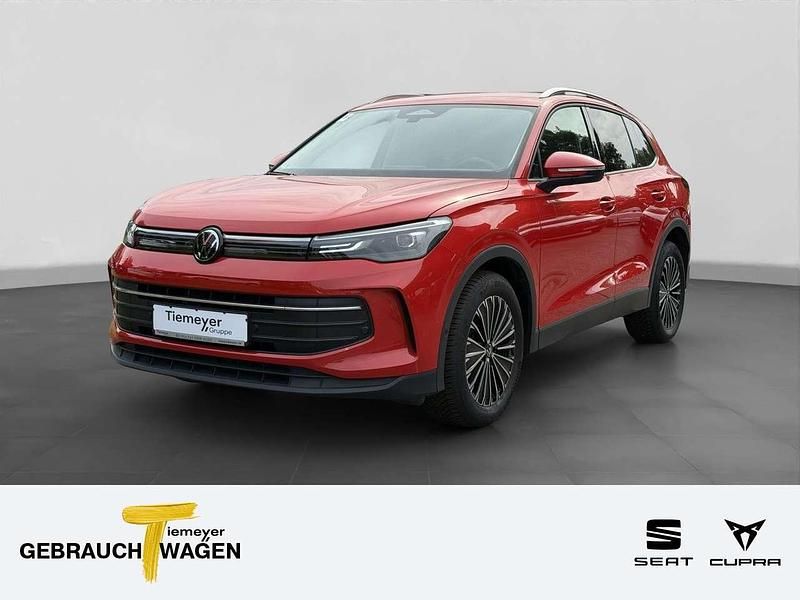 Persimmon red metallic Gebraucht 2024 VW Tiguan Life SUV | 34.490 € (Fairer Preis) - Bild 1/4