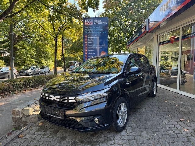 Grau Gebraucht 2023 Dacia Sandero Expression Kleinwagen | 16.400 € (Fairer Preis) - Bild 1/4