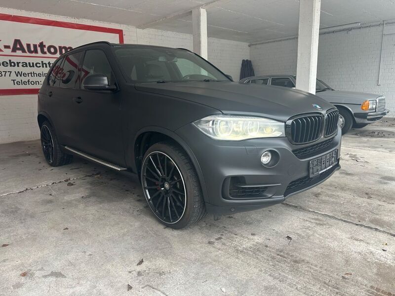 Black sapphire metallic Gebraucht 2013 BMW X5 Performance SUV | 22.890 € - Bild 1/4