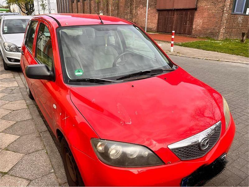 Second-hand Mazda 2 75 CP (55 kW) 2006 Roșu Hatchback