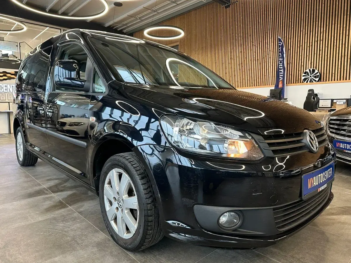 Second-hand VW Caddy Maxi 102 CP (75 kW) 2011 Negru Monovolum