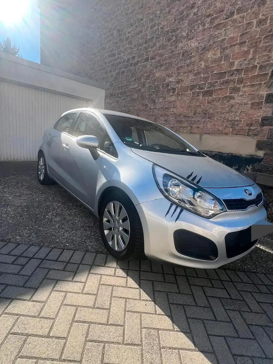 Second-hand Kia Rio 86 CP (63 kW) 2012 Argintiu Berlinǎ