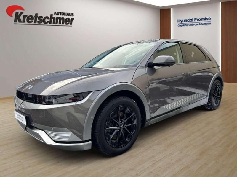 Mystic olive / mic Gebraucht 2022 Hyundai Ioniq Kleinwagen | 31.490 € (Guter Preis) - Bild 1/4