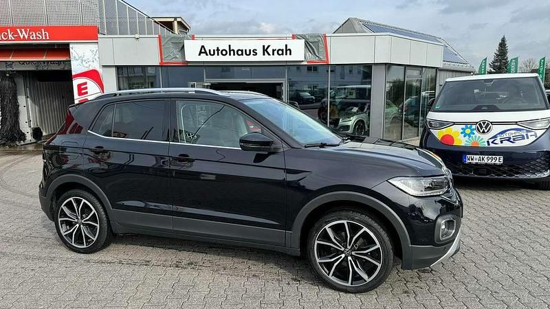 Deepblack perleffekt Gebraucht 2023 VW T-Cross Style SUV | 24.590 € (Fairer Preis) - Bild 1/4
