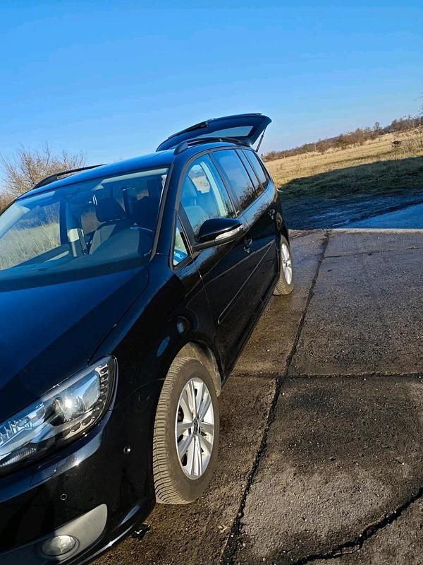 Gebraucht VW Touran 105 PS (77 kW) 2012 Schwarz Van / Kleinbus