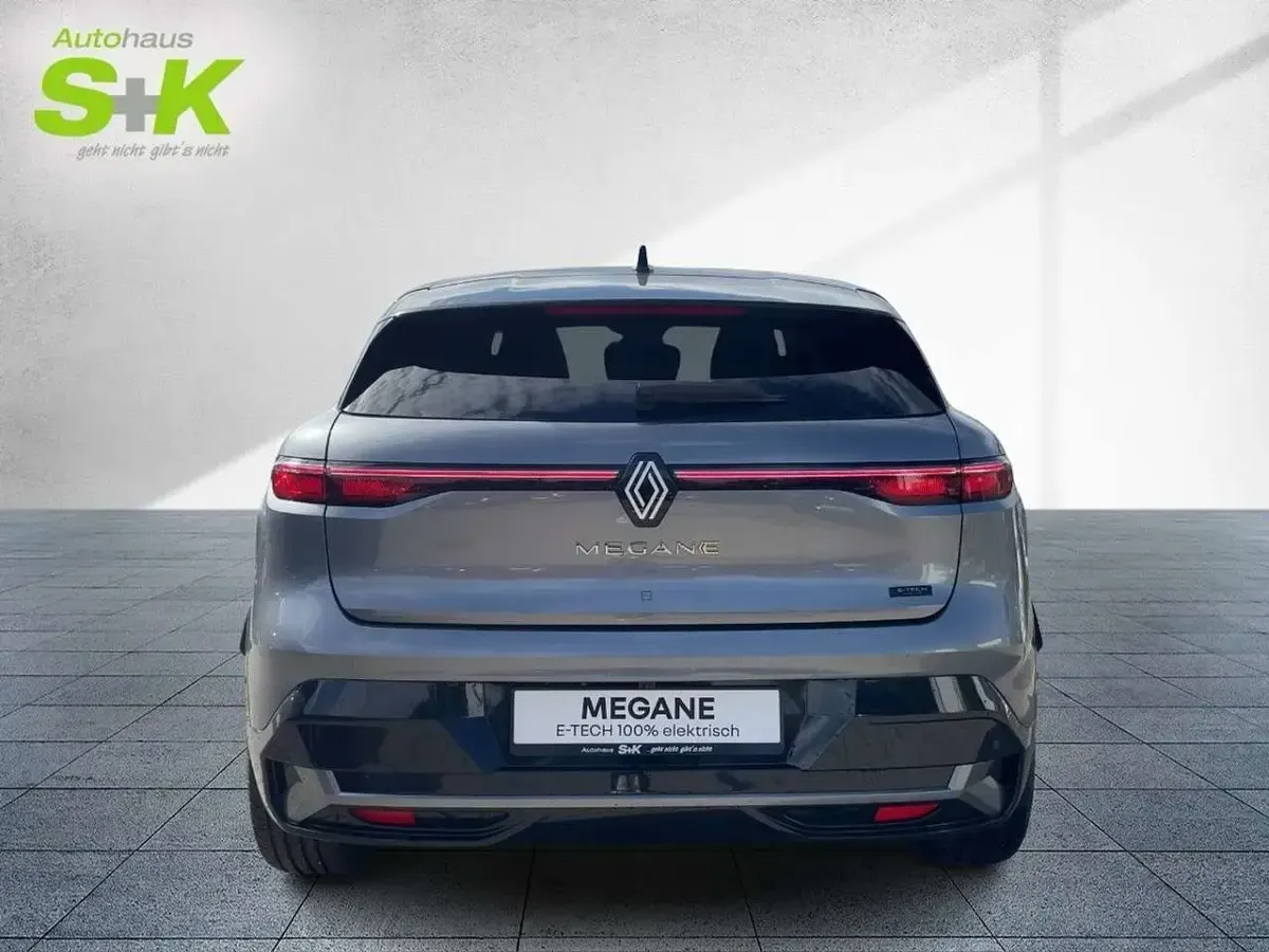 Gebraucht Renault Megane E-Tech Komfort 160 kW (218 PS) 2024 Dolomitgrau, dach in black pearlschwarz (grau) Limousine