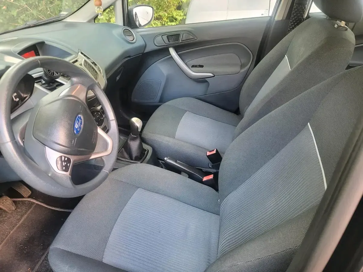 Gebraucht Ford Fiesta Titanium 82 PS (60 kW) 2011 Schwarz Kleinwagen