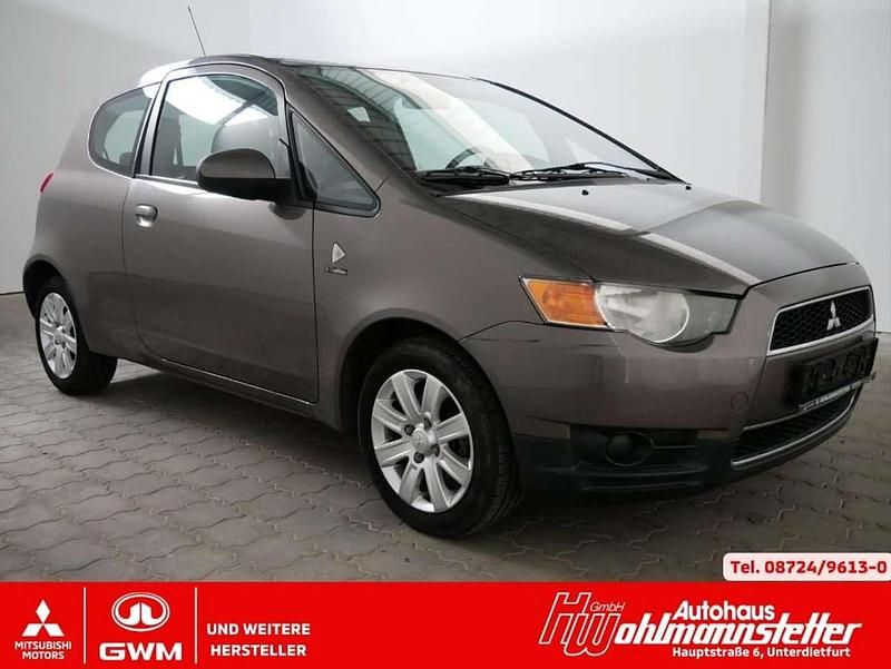 Granitbraun (m) Gebraucht 2011 Mitsubishi Colt Edition Limousine | 2.990 € (Fairer Preis) - Bild 1/4